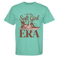 Mint green t-shirt with graphic design and text on a white background