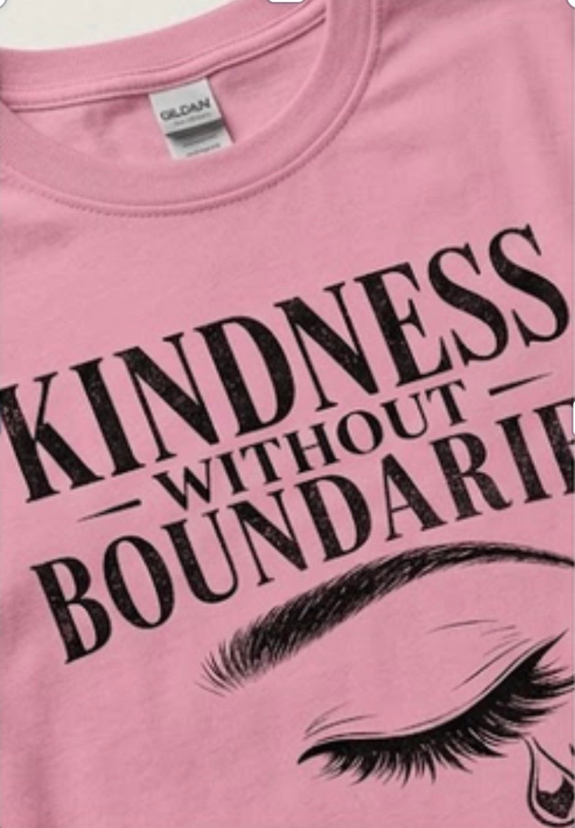 Pink t-shirt with 'Kindness without Boundaries' text and eye graphic