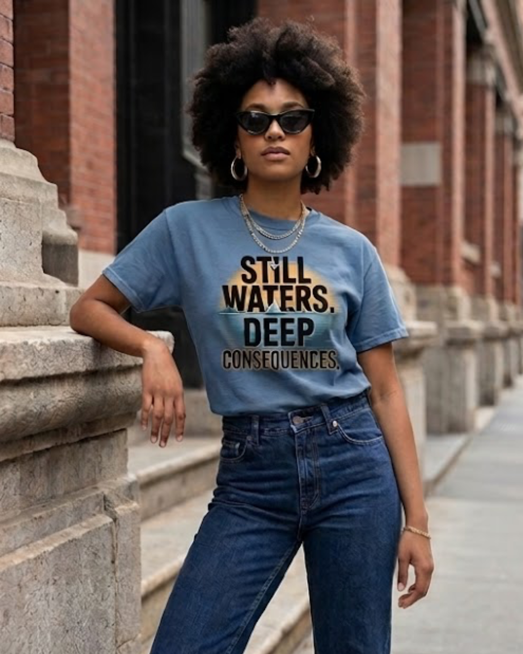     woman wearing still waters deep consequences shirt minimalist outfit